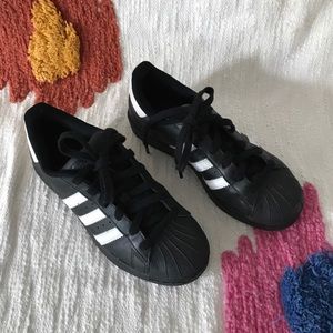 Adidas black superstar sneakers